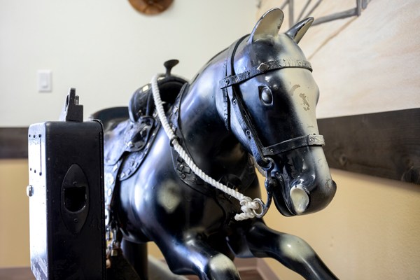 Vintage black mechanical rocking horse ride